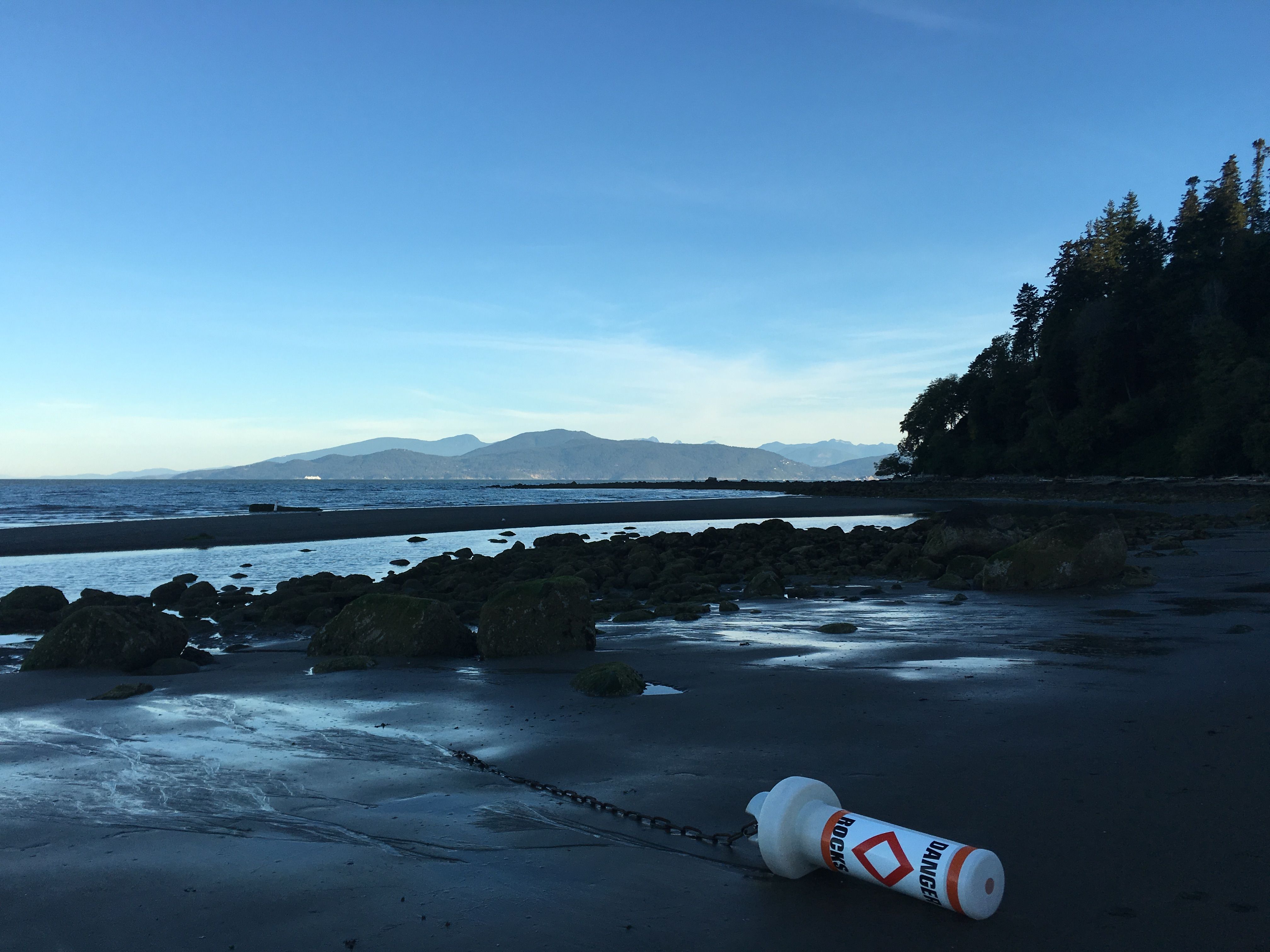 A buoy on its side at Wreck Beach